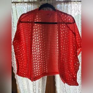 Cute salmon colored crocheted shrug/cardigan